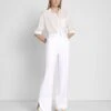 7 For All Mankind Denim Lustre Trouser In Brilliant White 2 7 For All Mankind Denim Lustre Trouser In Brilliant White -Sleek Fit Style 7e804be9d1b11227fe2b7c8e53f163e2